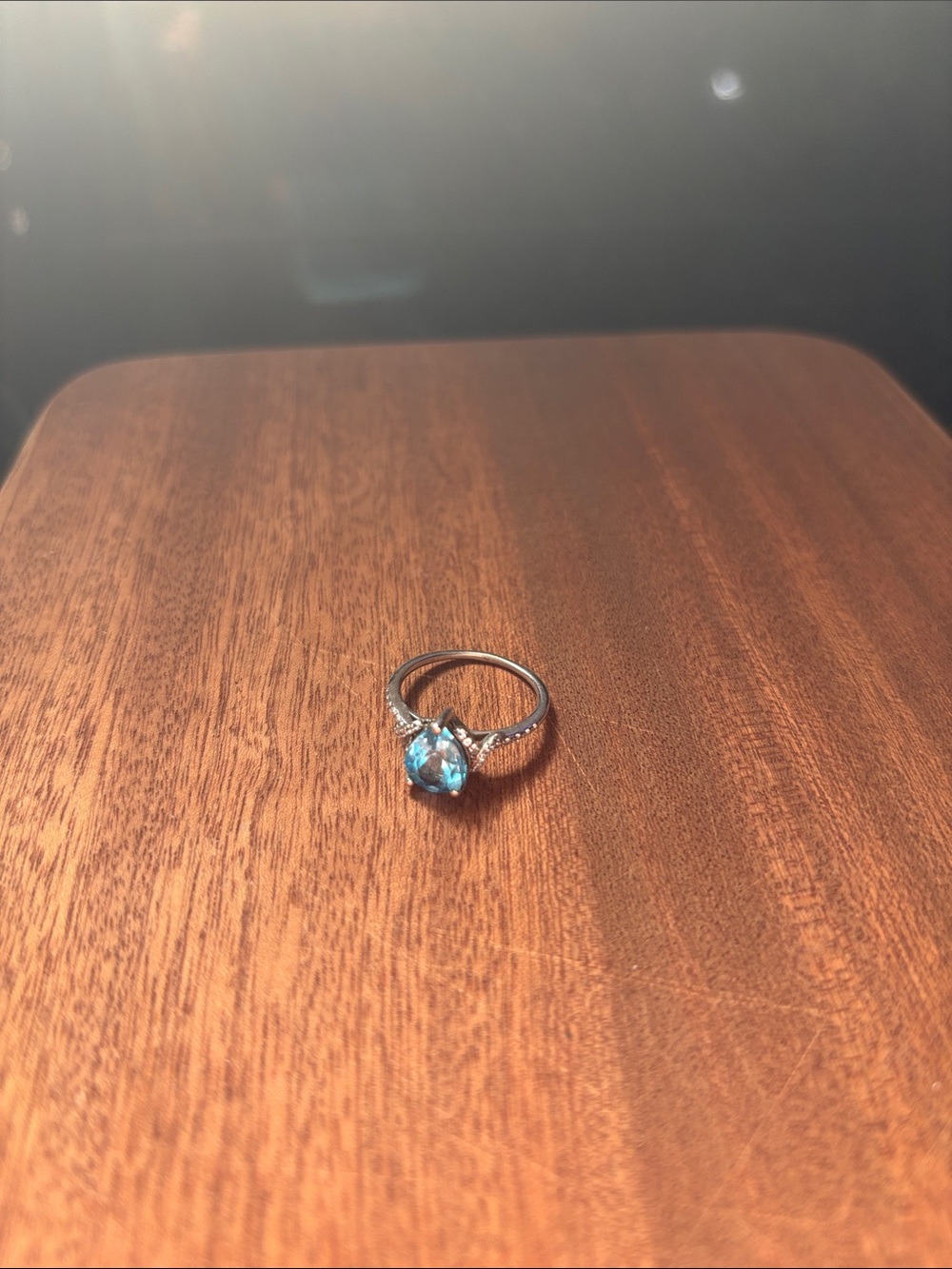 Sterling Silver Ring with Pear shaped Blue Topaz and Lab-created White Sapphires